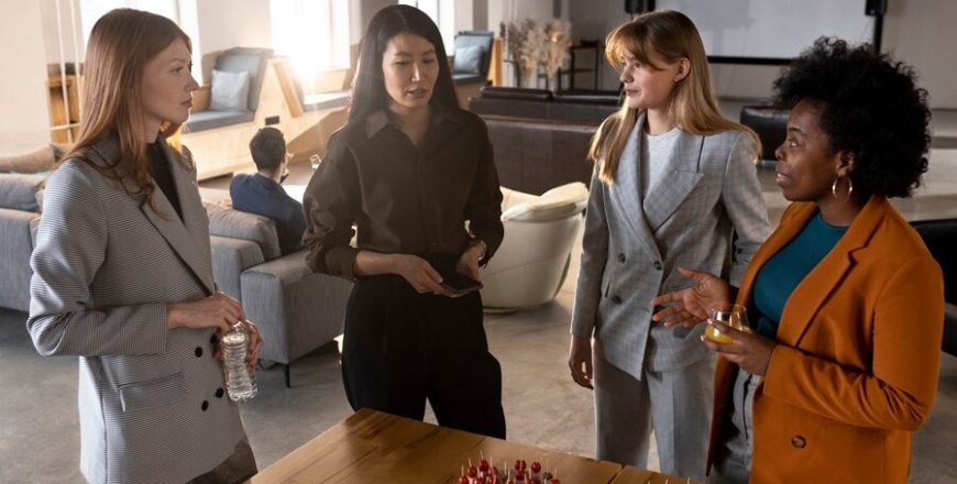 medium-shot-people-chatting-work-event_23-2149304720-870x440